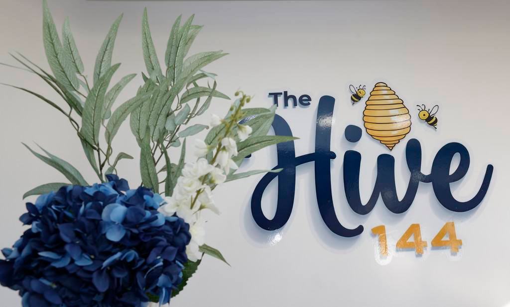 Close-up of blue seating area with wooden frames