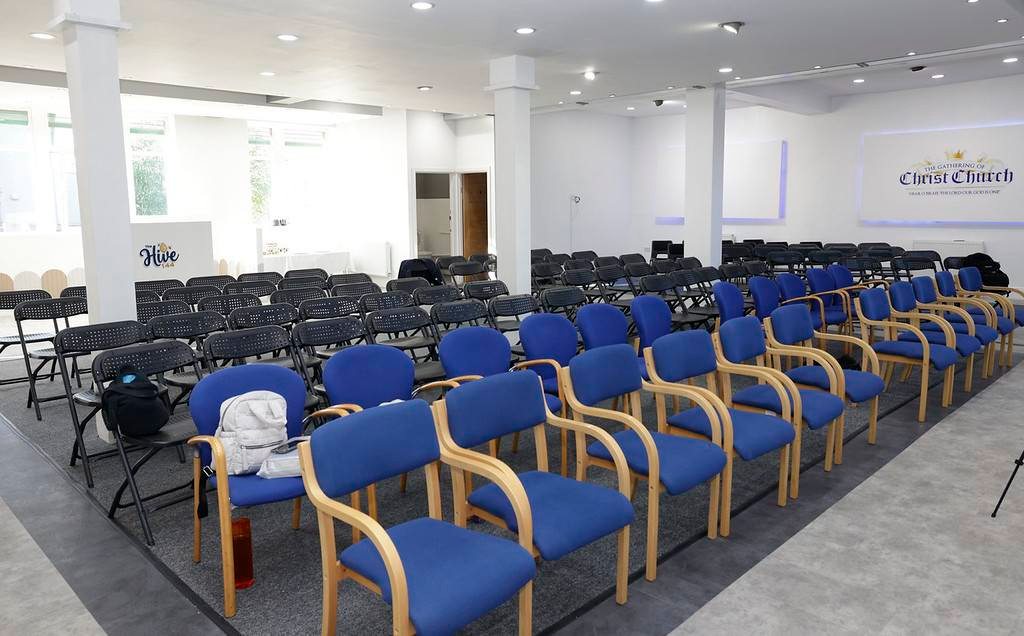 Main event space with blue seating arrangement